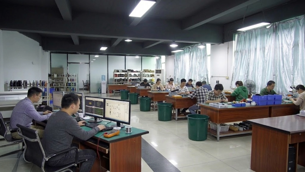 BUYREAL sample room team developing handbag prototypes in Guangzhou